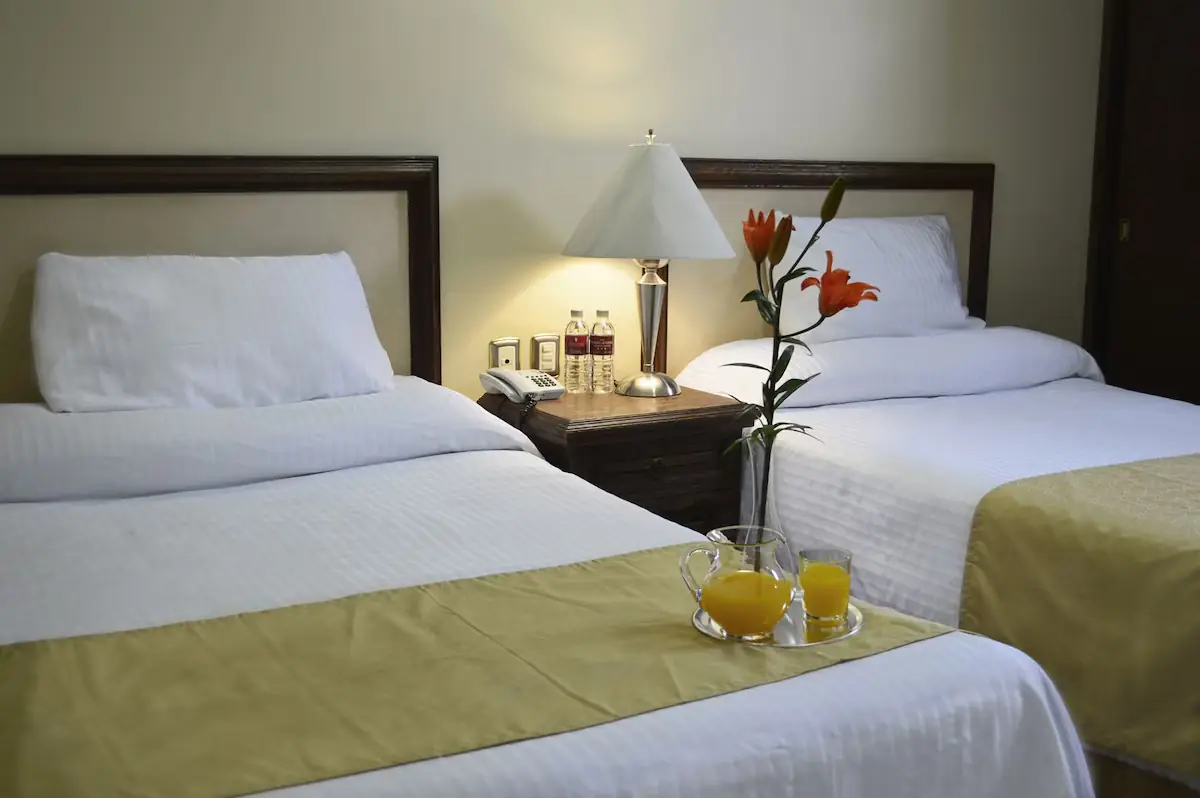 Comfortable guest room at Hotel Posada La Fuente